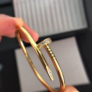 Cartier nail bracelet with diamonds, gold.